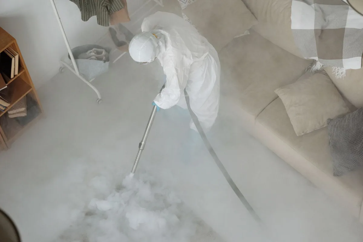 Biohazard cleanup technician in protective equipment, Wingdale, NY